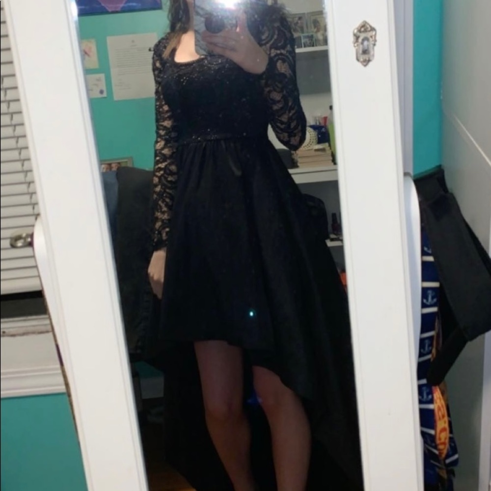 Black high/low prom dress. Sparkle lace sleeves with matte bottom. Worn once